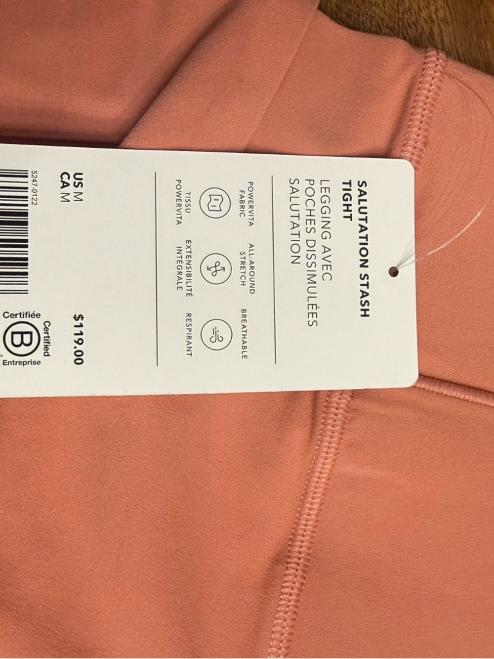 Athleta Salutation Stash Tight in Dusty Coral
